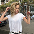 Balayage curly hair with natural blonde dimension by QUE Colour Sydney