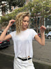 Balayage curly hair with natural blonde dimension by QUE Colour Sydney