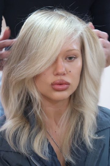 Cool, smoky blonde hair colour styled at QUE Colour salon in Sydney