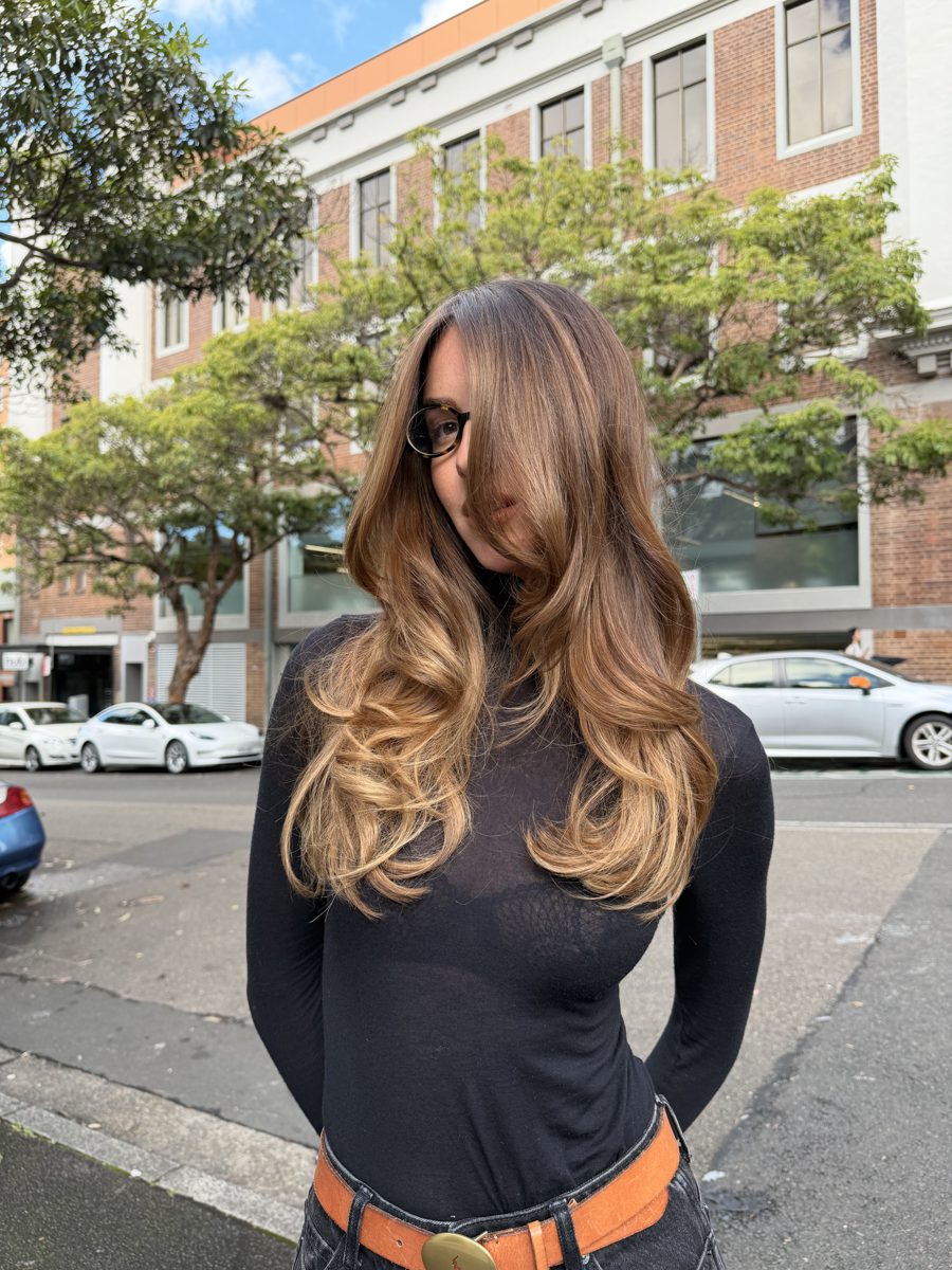 Warm dimensional brunette hair colour with balayage, an Autumn/Winter 2026 trend at QUE Colour Sydney